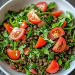 How to Make a Healthy American Lentil Salad That Wows 2 Healthy American lentil salad with fresh greens and colorful vegetables in a white bowl